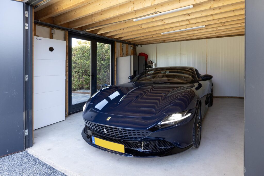 Home battery installed in a garage for storing solar energy